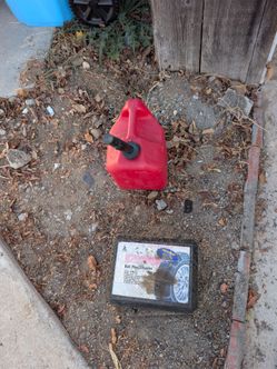 Red Plastic Gas Can with Spout, free snow tire chain