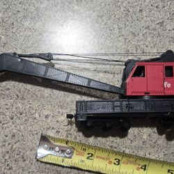 HO scale model of a Tyco Santa Fe Railroad crane car.