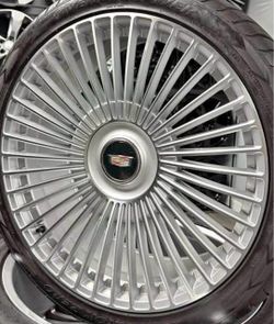 Cadillac Escalade 24” new silver monsory style new rims tires with floating caps