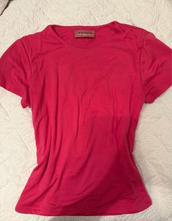 Tight fitted hot pink basic women’s shirt