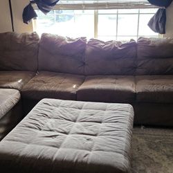 2 Part Sectional Couch With Ottoman. 