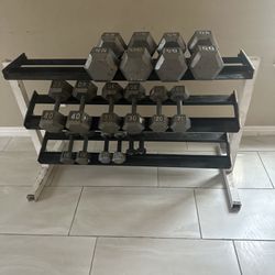 5-55 pairs of dumbbells weights 450lbs total plus rack