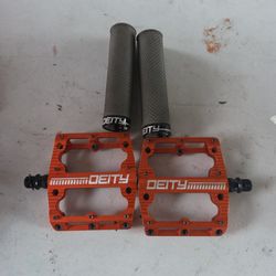 Deity pedals and grips