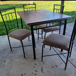Perfect size table with four chairs