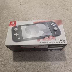 Nintendo Switch Lite + Case And Game
