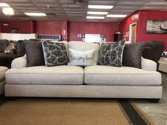 BRAND NEW ASHLEY DESIGN SOFA AND LOVE SEAT