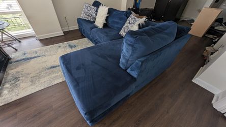 Blue Sofa with chaise and pillows