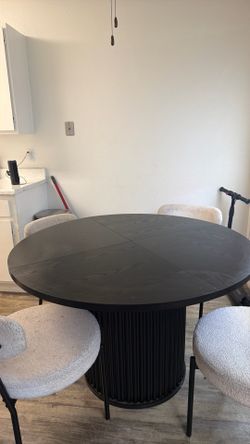 Table with 4 set of chairs