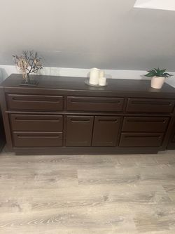 Moving sale! Dark Brown Wood Dresser with Multiple Drawers, includes 2 nightstands