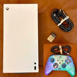Microsoft Xbox Series X Digital version with 2TB storage (1TB internal + 1TB WD Expansion). Excellent condition with controller and cables.