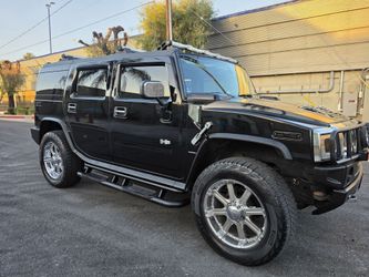 Hummer H2 SUV Black with Chrome Wheels