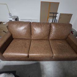 Signature Design by Ashley "Bolsena" Leather Sofa/Loveseat Bundle - $800