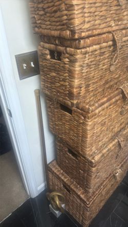 Five straw baskets for storage
