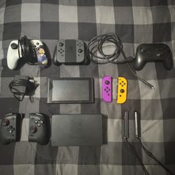Nintendo Switch w/ Accessories and Mario Kart 8 Deluxe