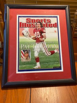 Pat Tillman framed with other cardinal paraphernalia