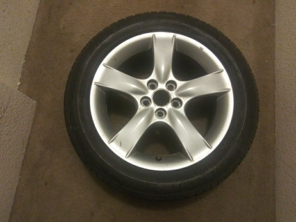 Suburu rims with tires
