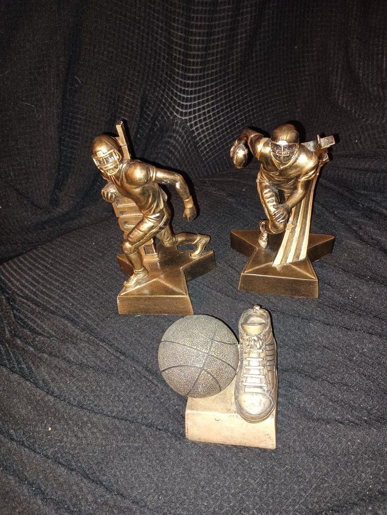 Three Trophies To Football One Basketball