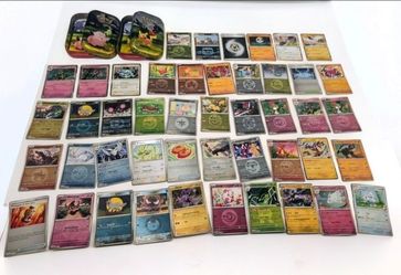 Bulk pokemon cards + 2 tins - see description