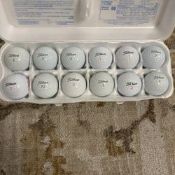 A Dozen Titleist Golf Balls