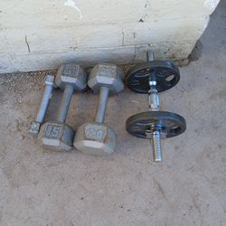 (1) 20 Lb. Dumbbell (1) 15 Lb. Dumbbell (1) 3 Lb. Dumbbell  (1) Adjustable Dumbbell All For $40 Firm!