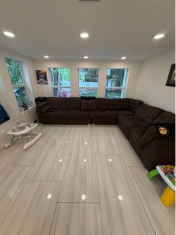 Large brown sectional couch