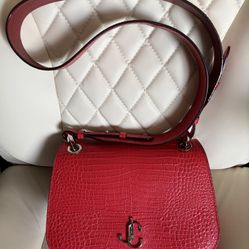 New Designer Jimmy Choo handbag with authenticity card, dust bag and box. Original price $1495 asking for $750 FIRM.