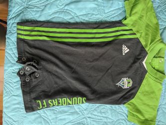 6/9 months Sounders romper