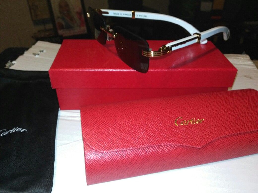 Cartier..white arm bar/ black tint