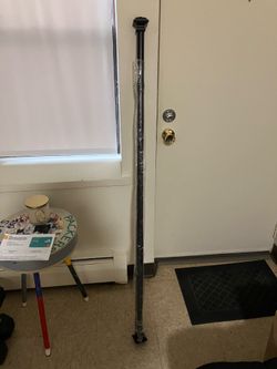 Wall room divider with curtain