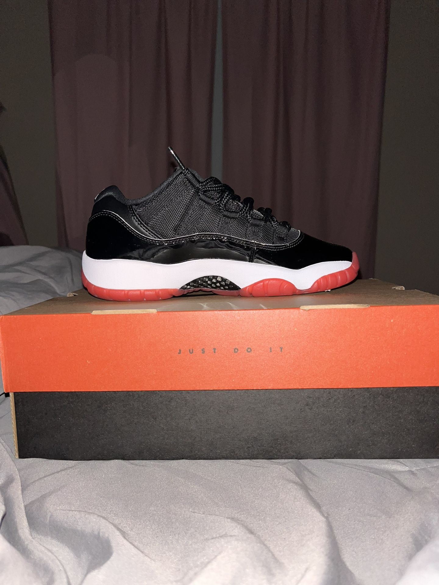 Jordan 11 Low Retro Bred