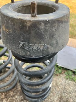2004 dodge ram 2500 front springs and ride leveler