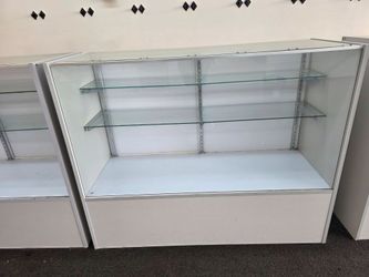 8 good quality lightly used display cases, all of them are 18ft. By 4ft. $150 each