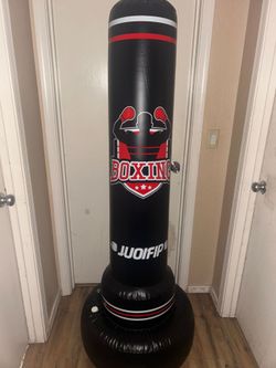 Inflatable punching bag