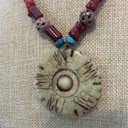 CORAL BRANCH BONE MEDALLION NECKLACE $60.00