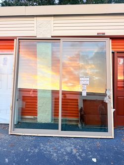 Pella 150 Series 96-in x 96-in x 4-9/16-in Jamb Fossil Vinyl Right-hand Patio Door with Low-E Glass