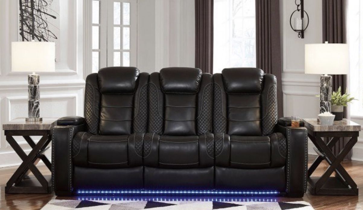 Brand New Power Reclining Sofa And Loveseat