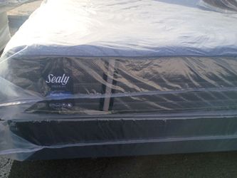 Brand new queen size plush Sealy mattress and box spring free delivery depends on location
