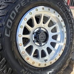 17" LOCK YOSEMITE rims w/ 33" Cooper Discoverer AT tires. $1400