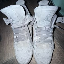 Jordan 4 Gray Kaws
