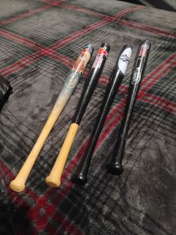 Miniature wooden baseball bats