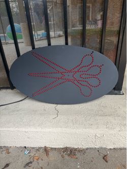 Beauty salon sign in good condition