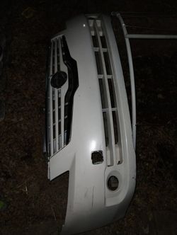 2007-2009 Complete Nissan Bumper ! Has A Crack On One Side, But Not Bad
