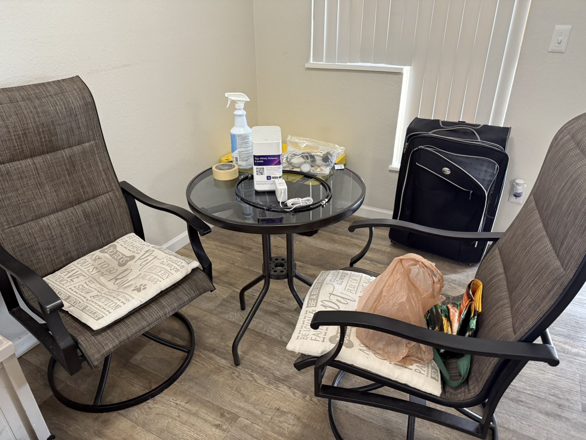 Outdoor chairs and glass table