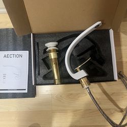 New Bathroom faucet in white and gold