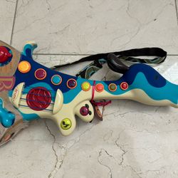 B. Woofer Dog Guitar Toy