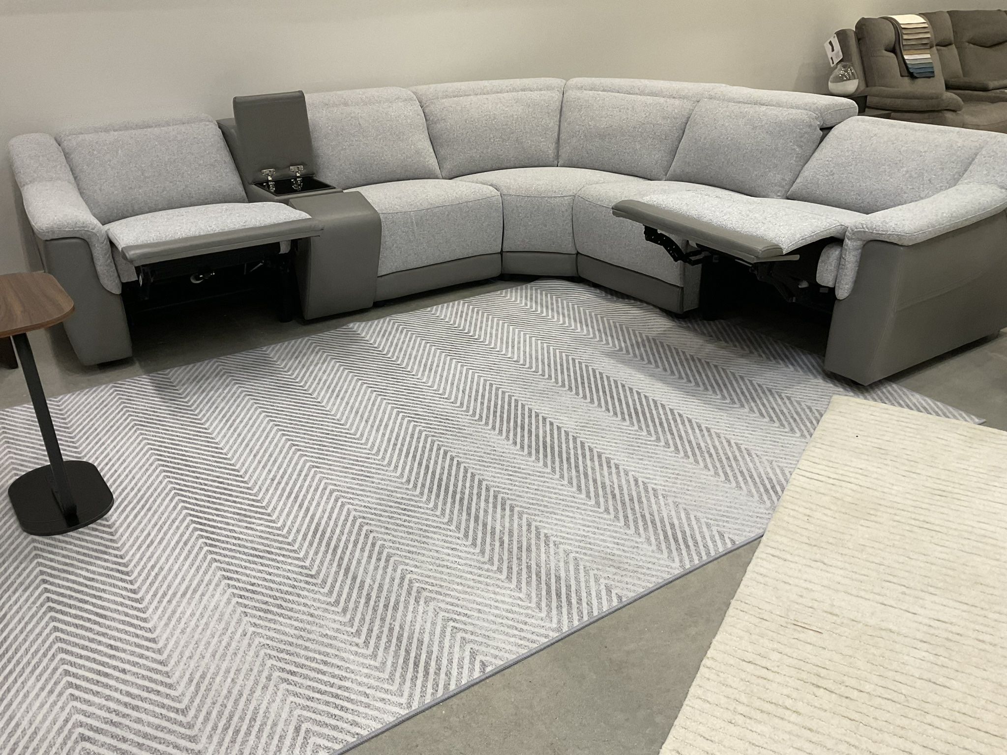 New Dual power recliner sectional sofa gray color leather and fabric.