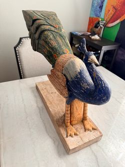 Wood carved peacock