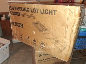 LED parking lot lights dusk to Dawn brand new 195 set of three firm on price