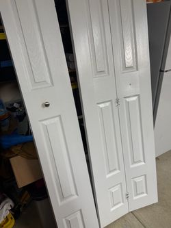 48” opening white bi-fold doors