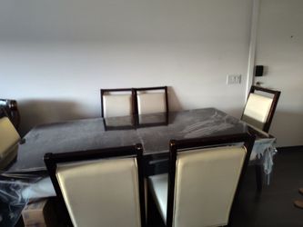 Dinning room set cherry wood with extension and six chairs like new